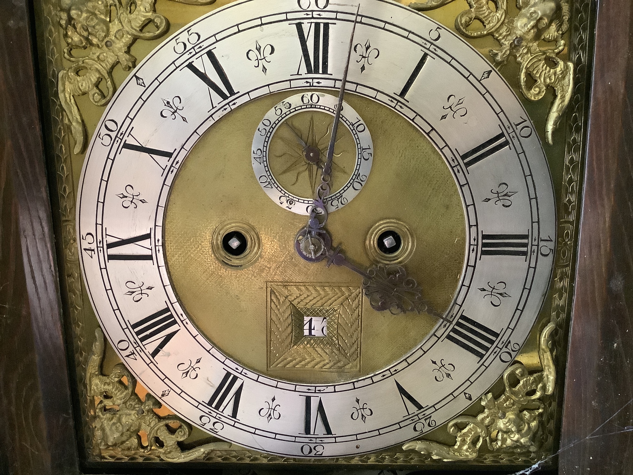 An 18th century style 8 day walnut grandmother clock, with globe and calendar aperture. H-156cm.